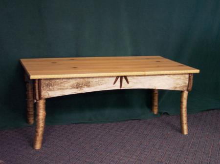 Coffee Table-Pine top was made from a log recovered from a mill pond; it was put in the pond after the hurricane of 1938.Table designed & built by Joe Monasky