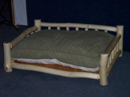 Aspen Log Dog Bed with large pillow<br />12"h x 43"w x 33"d<br />$520.00