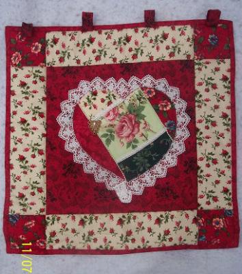 This crazy heart was made using an Eleanor Burns Pattern, 100% cotton fabric & embellishments.Machine pieced & machine quilted by Linda Monasky.