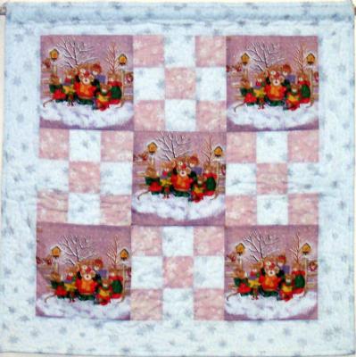 Caroling mice squares and 9-patches make up this cute little Christmas wallhanging.All 100% cotton fabrics used. Machine pieced and machine quilted by Linda Monasky  <br /><br />