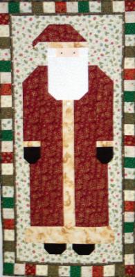 This quilted santa is a Debbie Mumm pattern. It makes a cute door decoration for the Christmas season.100% cotton fabrics & polyester batting used. Machine pieced and machine quilted by Linda Monasky <br />  