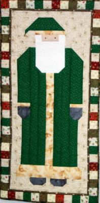 This quilted santa is a Debbie Mumm pattern. It makes a cute door decoration for the Christmas season. 100% cotton fabrics & thin polyester batting.Machine pieced and machine quilted by Linda Monasky <br />