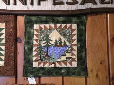 This machine applique wall hanging was designed by Debbie Field. Top & backing are constructed of quality 100% cotton, batting is thin polyester. Machine pieced, machine appliqued and machine quilted by Linda Monasky