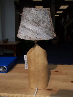 This beaver chew lamp base comes without a shade. Beaver chew found in nature and wired by Joe Monasky.
