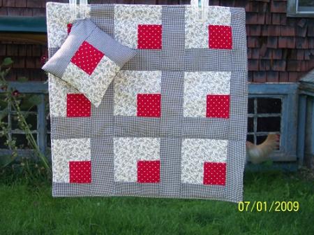 This doll blanket and pillow are black, white & red. Perfect for any little doll or animal that needs a quilt.