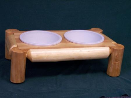 Aspen Log Dog Food Dish Holder     16 1/2"w x 27"w x 11 1/2"h<br />$195.00